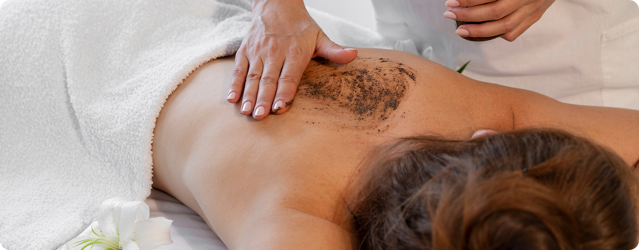 Coffee-infused body shaping treatment session