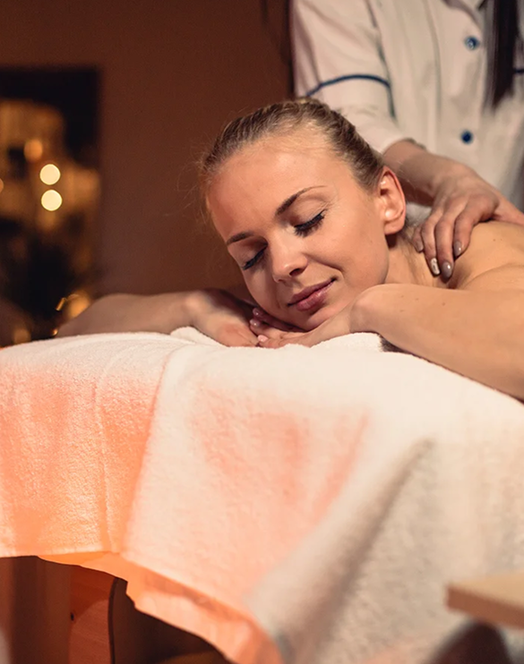 Beautiful Asian woman receiving massage